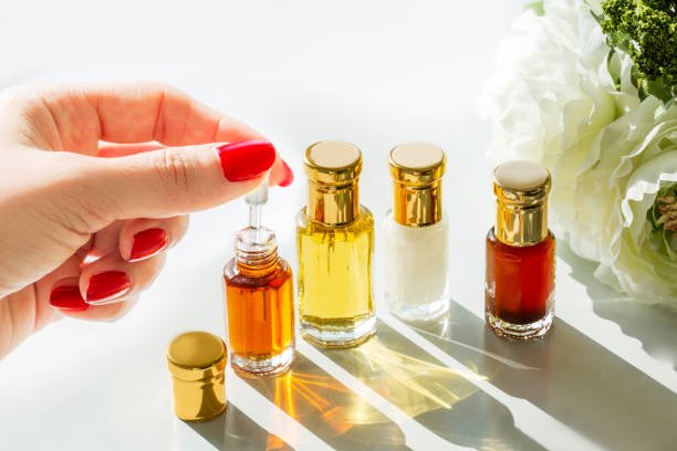 Pure oud essential oil in a frosted glass vial, hydro-distilled from plantation Aquilaria sinensis chips