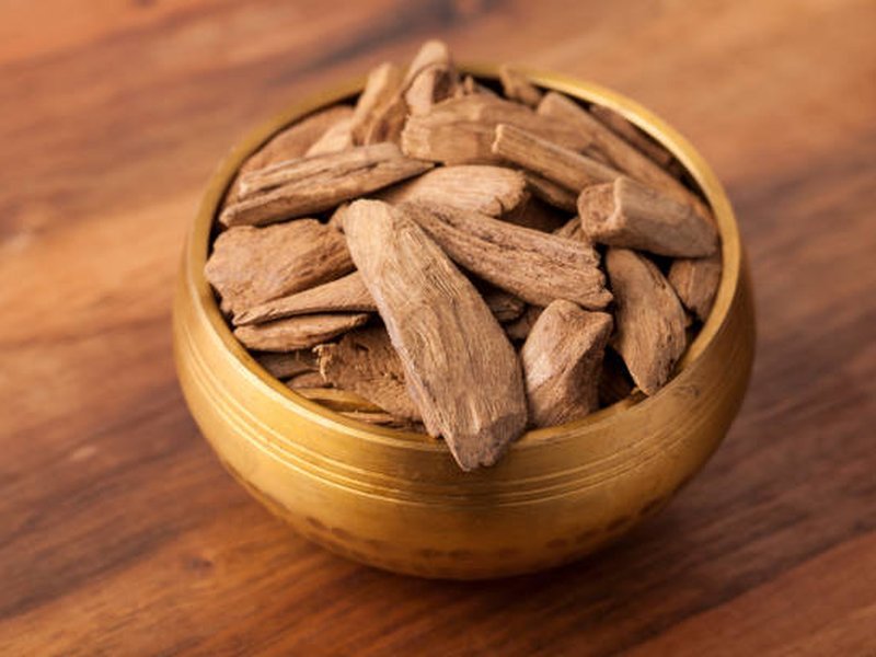 Agarwood bakhoor chips in a jar, the soaked mabsoos style most often sold for everyday home use