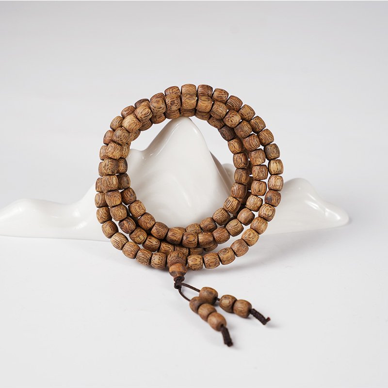 Multi-Wrap Drum Bead Agarwood Bracelet — Layered multi wrap drum bead agarwood bracelet — Aquilaria sinensis oud beads in stacked formation., image 3